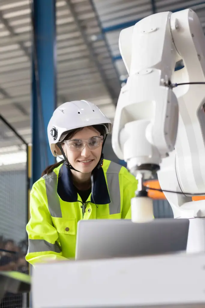 female technician engineer using laptop checking